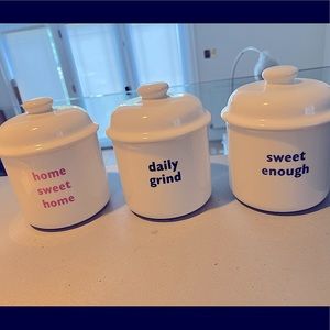 “Little Tomato Company” ceramic cannisters.